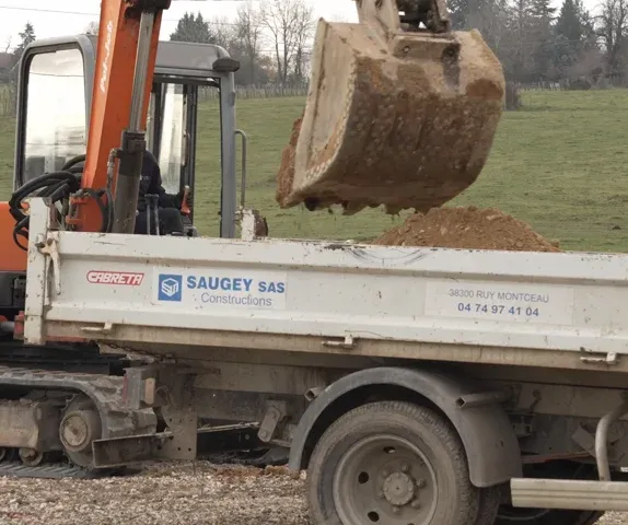 A Saugey excavator produces the foundations of an agricultural building